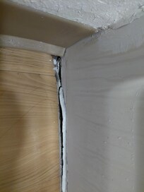 Hole in floor by the bathtub