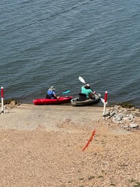 Enjoying the kayaks that are available with the cottage rental