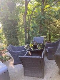 The rear of property overlooks a wooded area and is very private. Perfect for a fire !