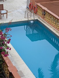 Pool way smaller than their fake online photos with super dirty water.