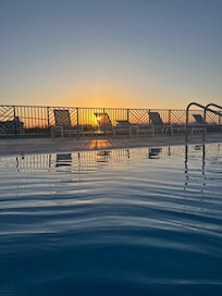 Rooftop pool at sunset