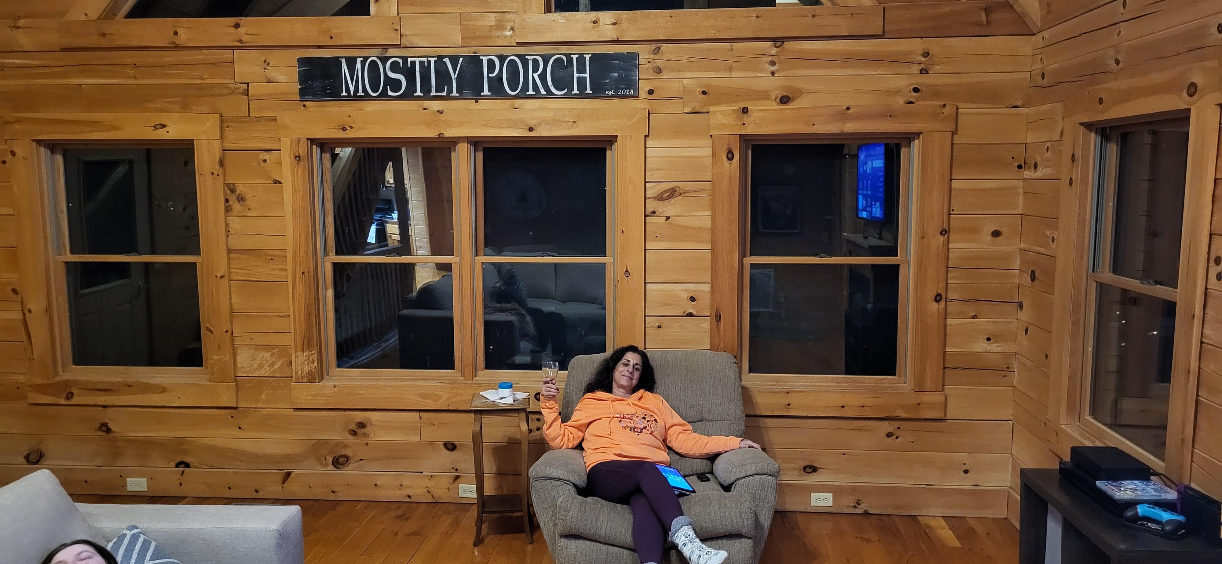 My wife truly embracing the relaxing energy of Mostly Porch. 