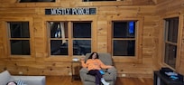 My wife truly embracing the relaxing energy of Mostly Porch.