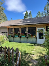 Front of cottage with screened porch