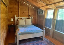 sunlit main bedroom