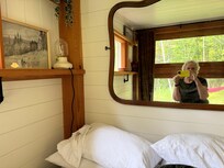 My comfy bed tucked into its own cozy nook