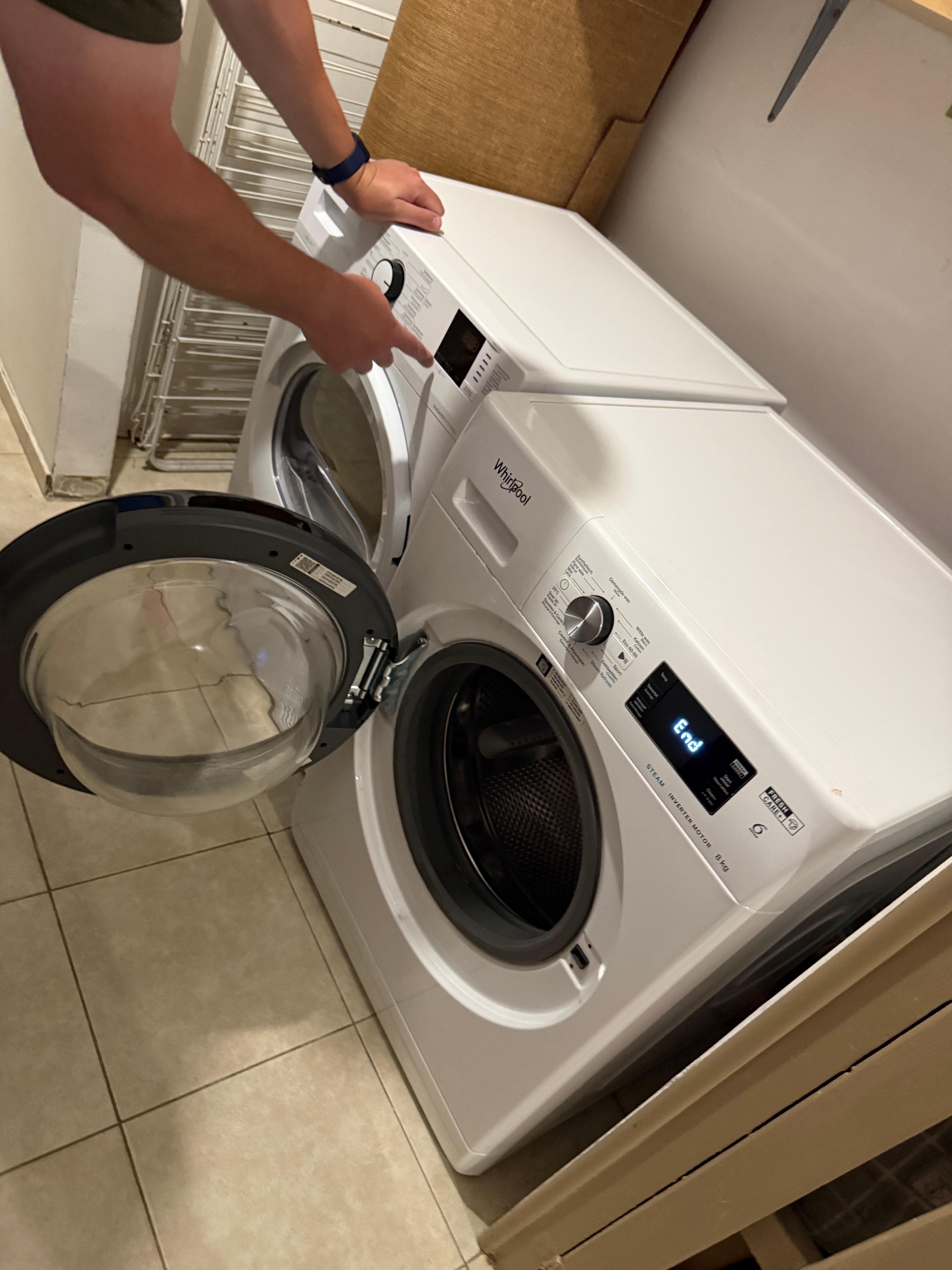 Communal washer and dryer with potential long waits.