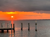 A beautiful sunset from the gazebo on the private pier.