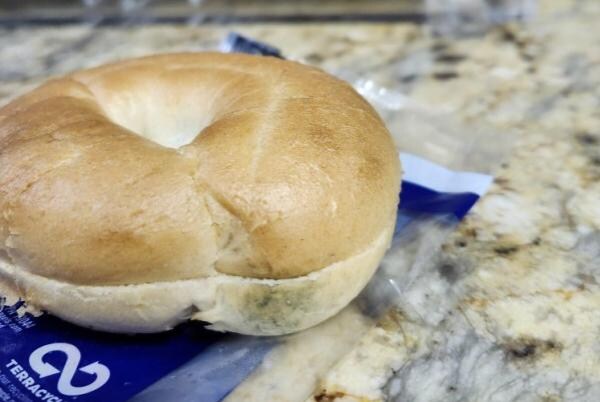 mold on the bagel.  The other one I tried was wet on one side, like it was in water in the bottom of a a cooler.  Same thing with the bread.  Had a hard time finding anyone who spoke English and could understand the problem