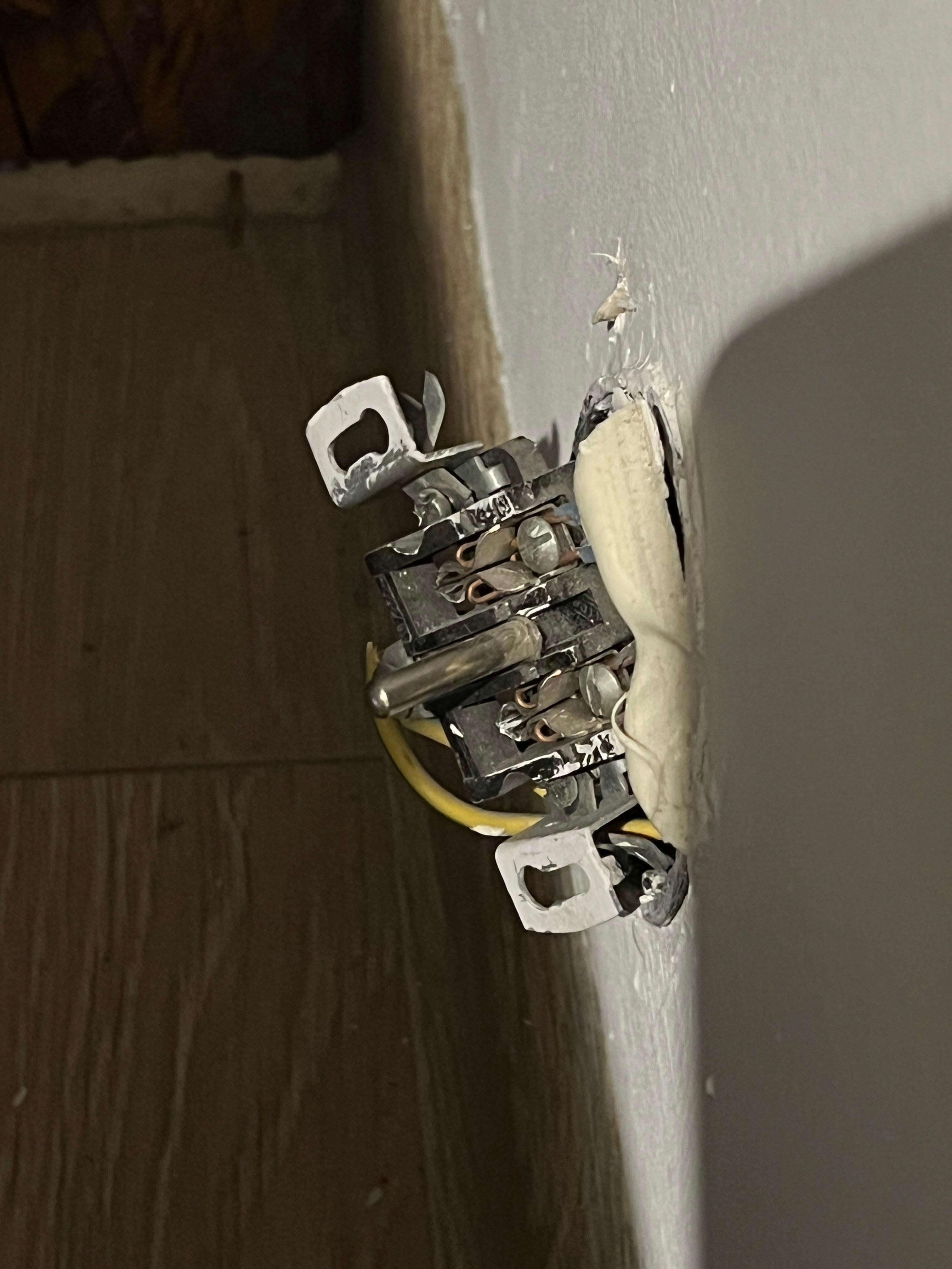 Electrical outlet by bed 