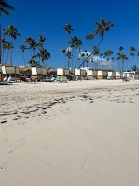 All the long chairs are lined up behind those