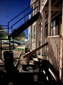 Entry through the dark back alley.