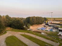 Zicht op “meer” en bouwplaats