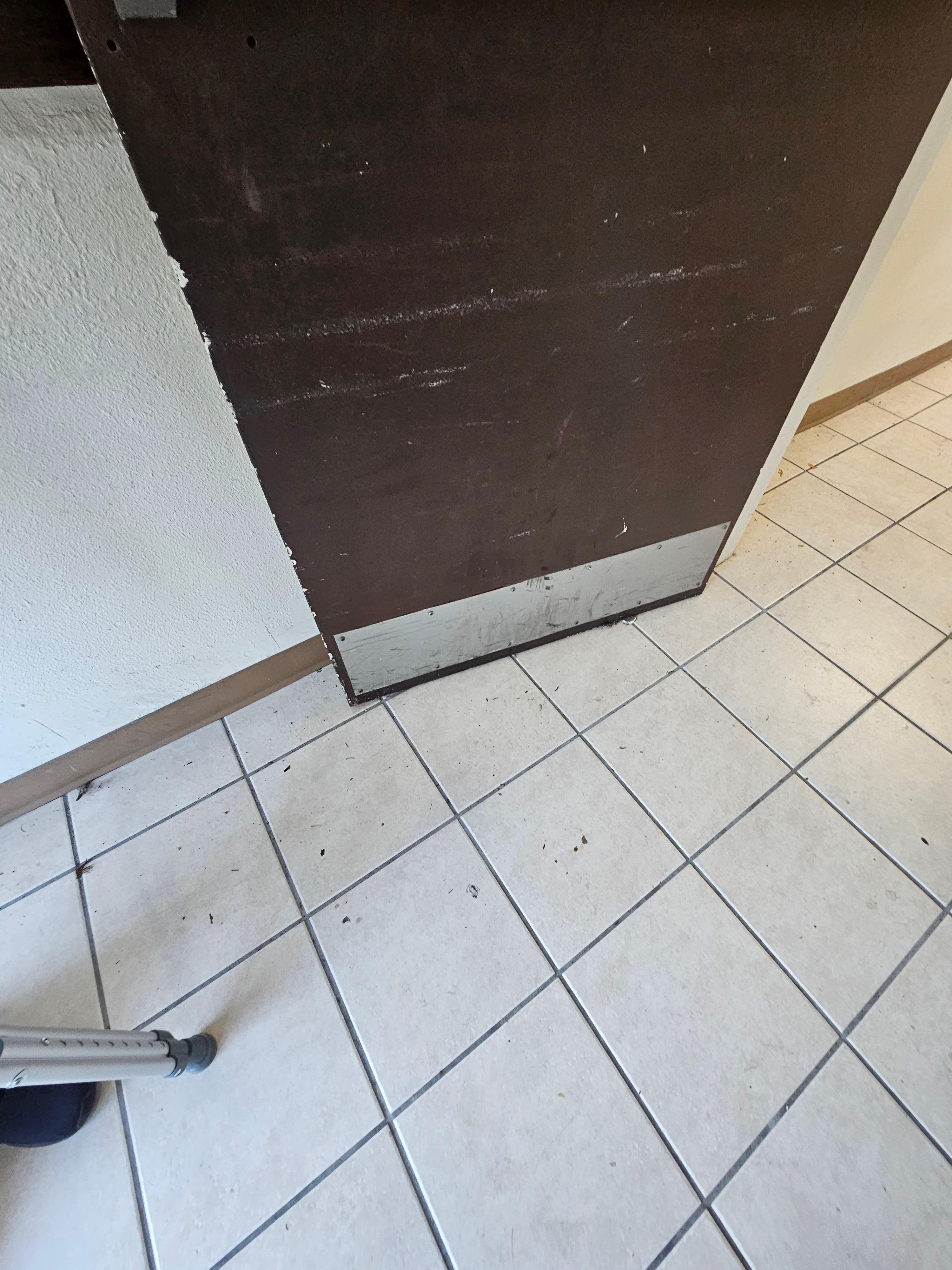 floor in hallway, not swept or mopped in some time. Ice machine was broken