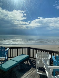 Deck view!!! Spent most of the time there!! So close to the beach it was like you were sitting on it!!