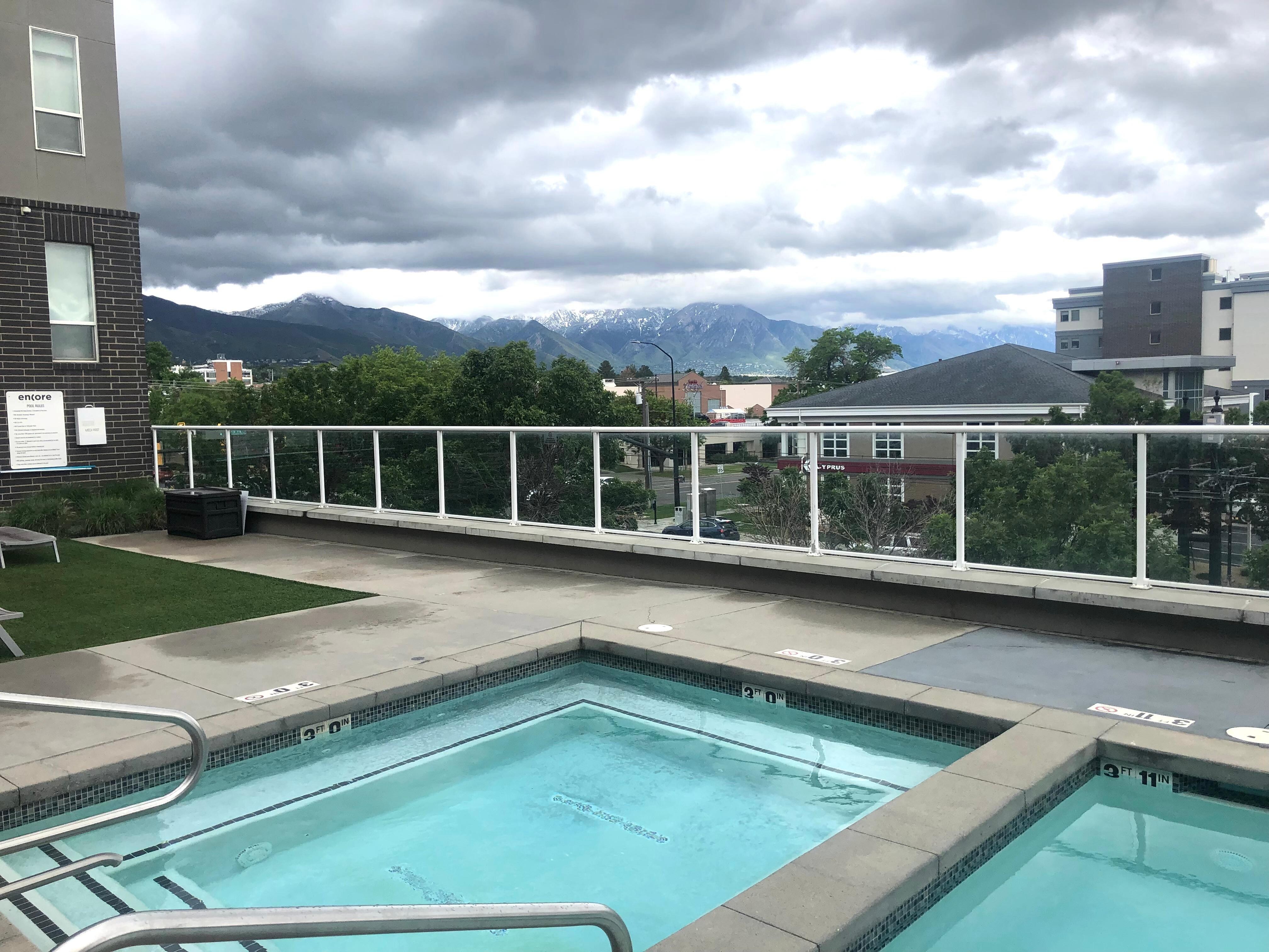 Heated swimming pool and hot tub on first floor
