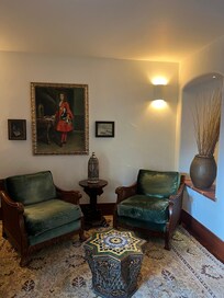 Cute alcoves and corners are filled with art and cozy places to sit and visit within the halls of the hotel.