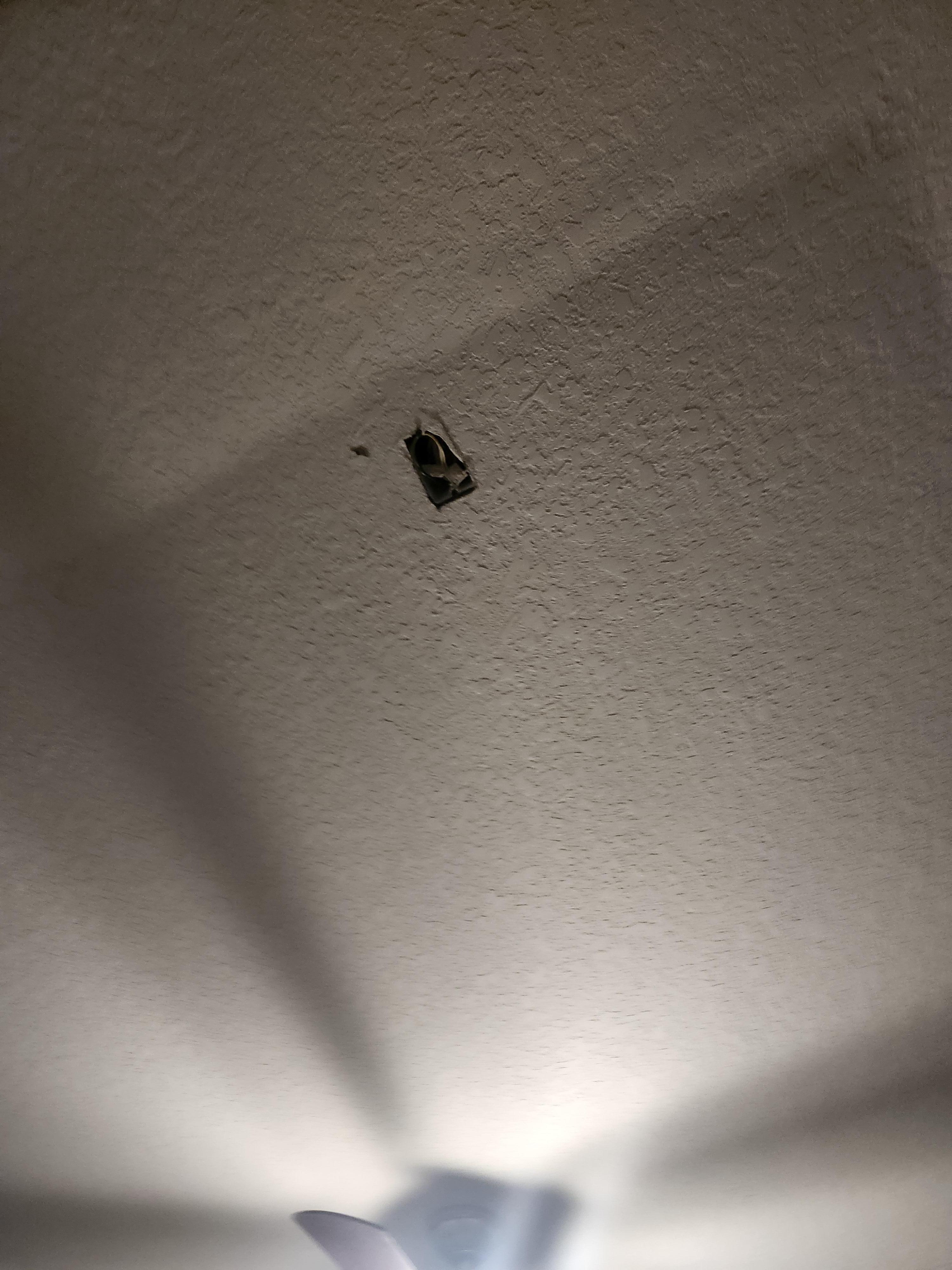 Hole in the master bedroom ceiling. 