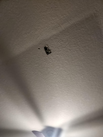 Hole in the master bedroom ceiling.