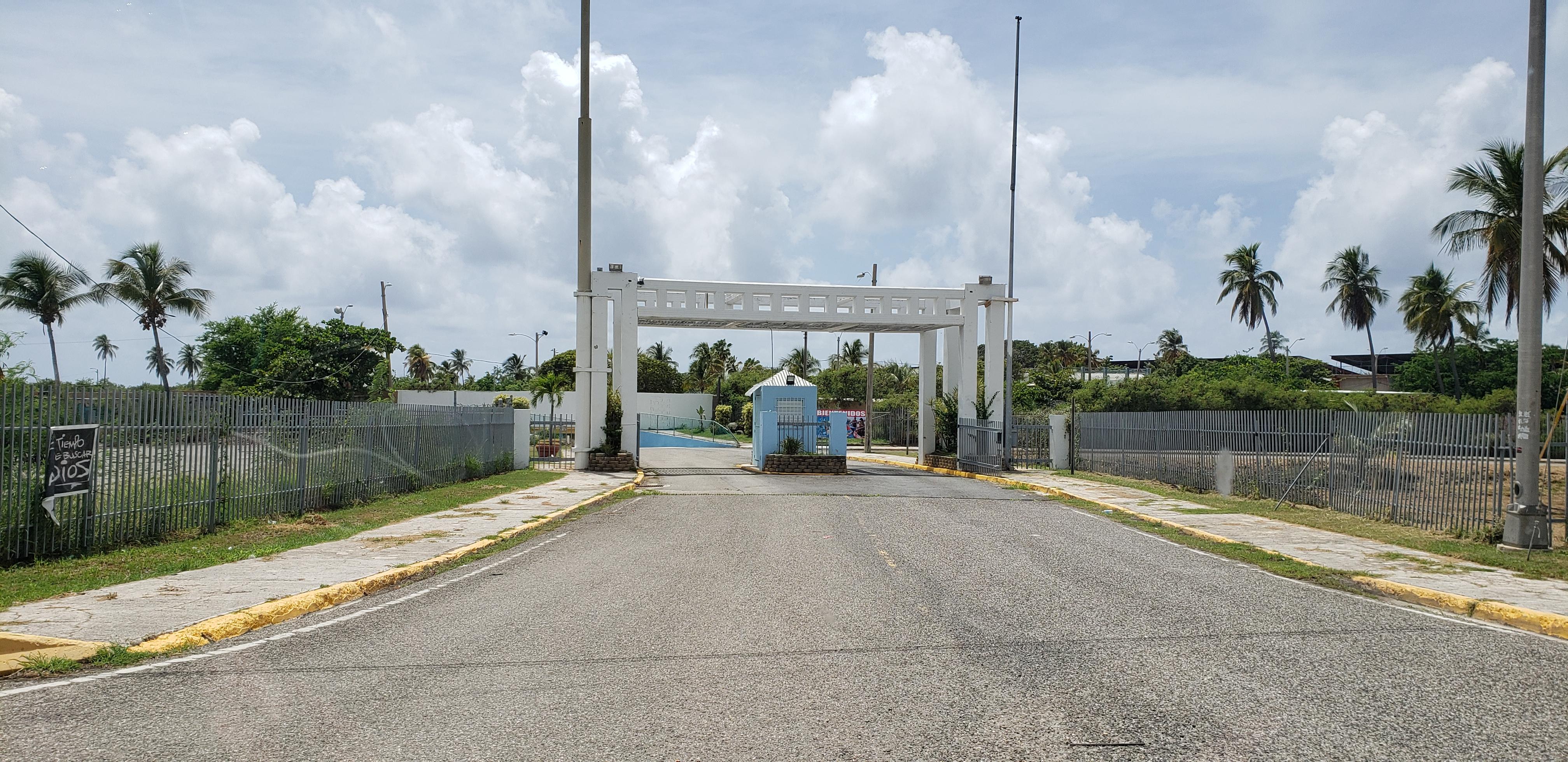 Main entrance with no signs of the Hotel or the Mech Tech College or beach passed this gate. 