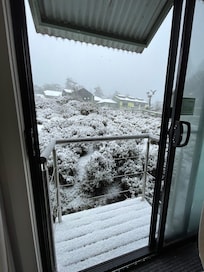 Small balcony with stunning view, perfect for small children enjoyed the snow.