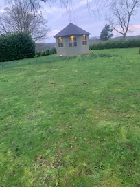Garden cabin , one of three with hot tubs inside .