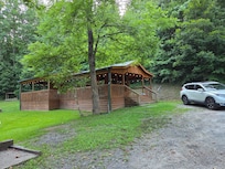 A view of the cabin from the wooden bridge.