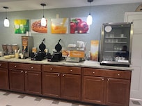 Breakfast buffet including waffle and pancakes