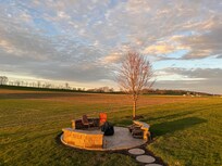 Fire pit stocked with wood