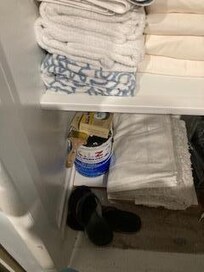 No room to put "guest" clothing in closet packed with towels, sheets and can of paint