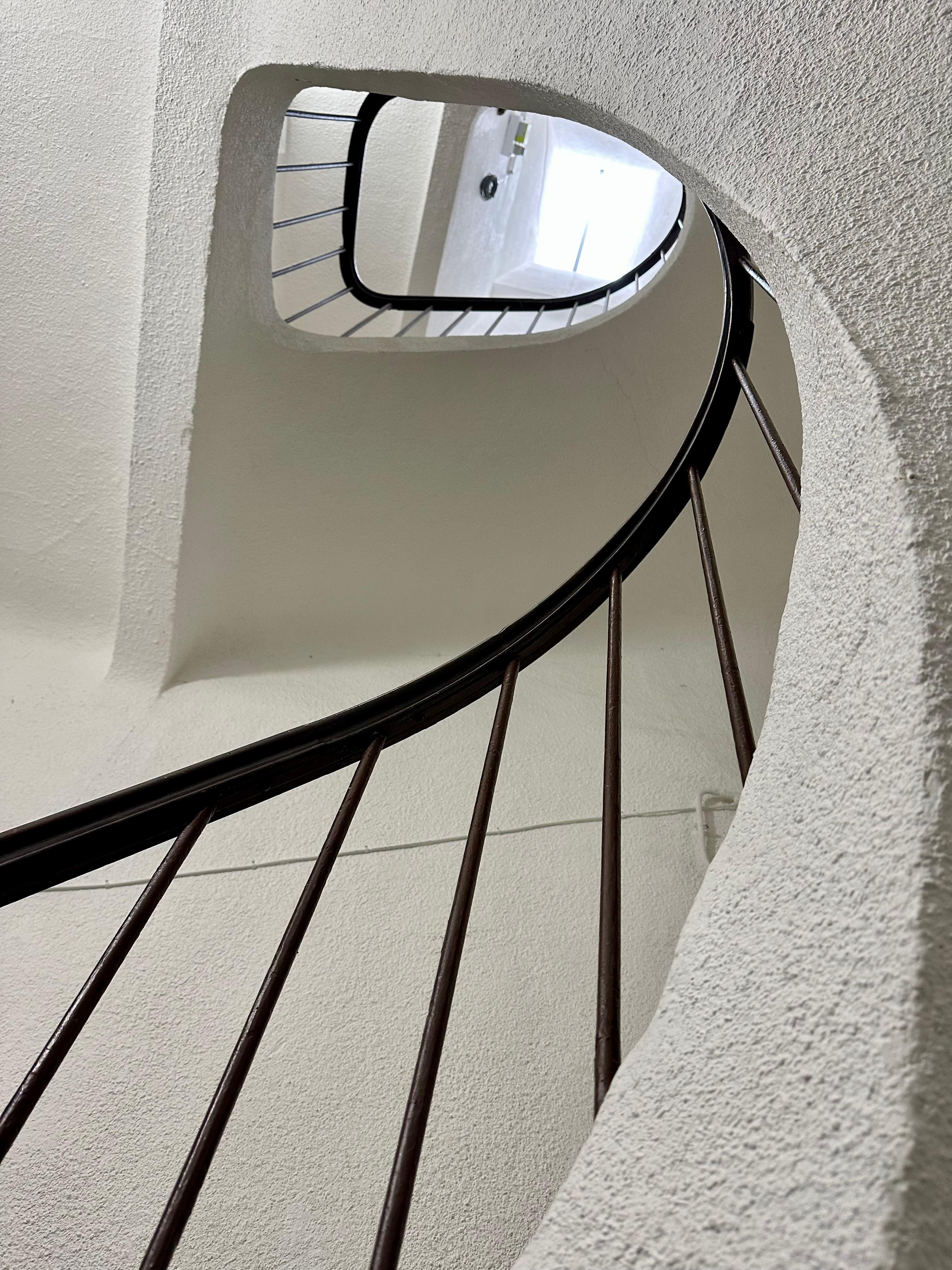 Dangerous steep and poorly lit stairs to third floor