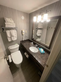 Bathroom ( Comes with a tub and integrated shower )