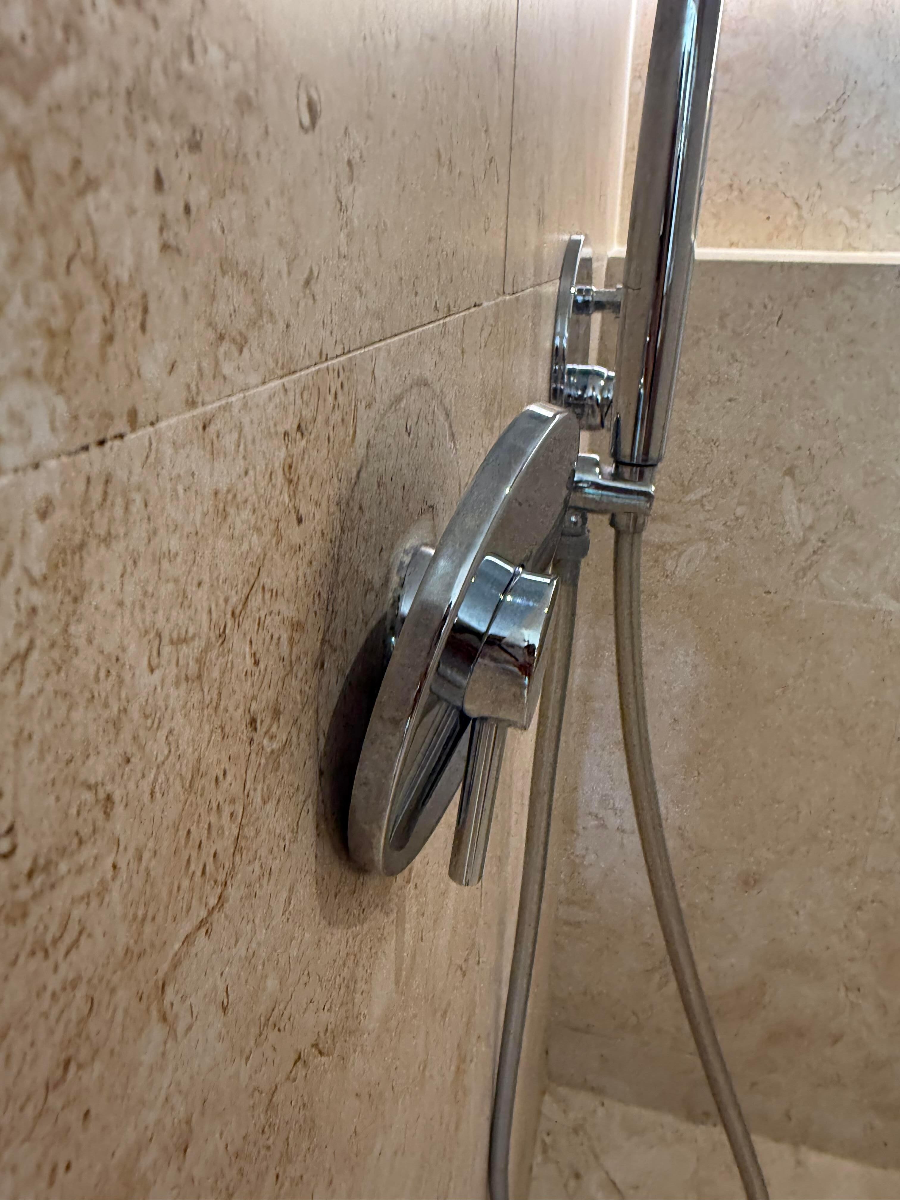 Broken shower (this is the "upgraded room")