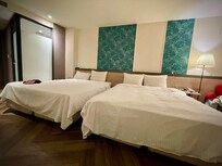 Our bedroom was a quadruple room with two queen beds