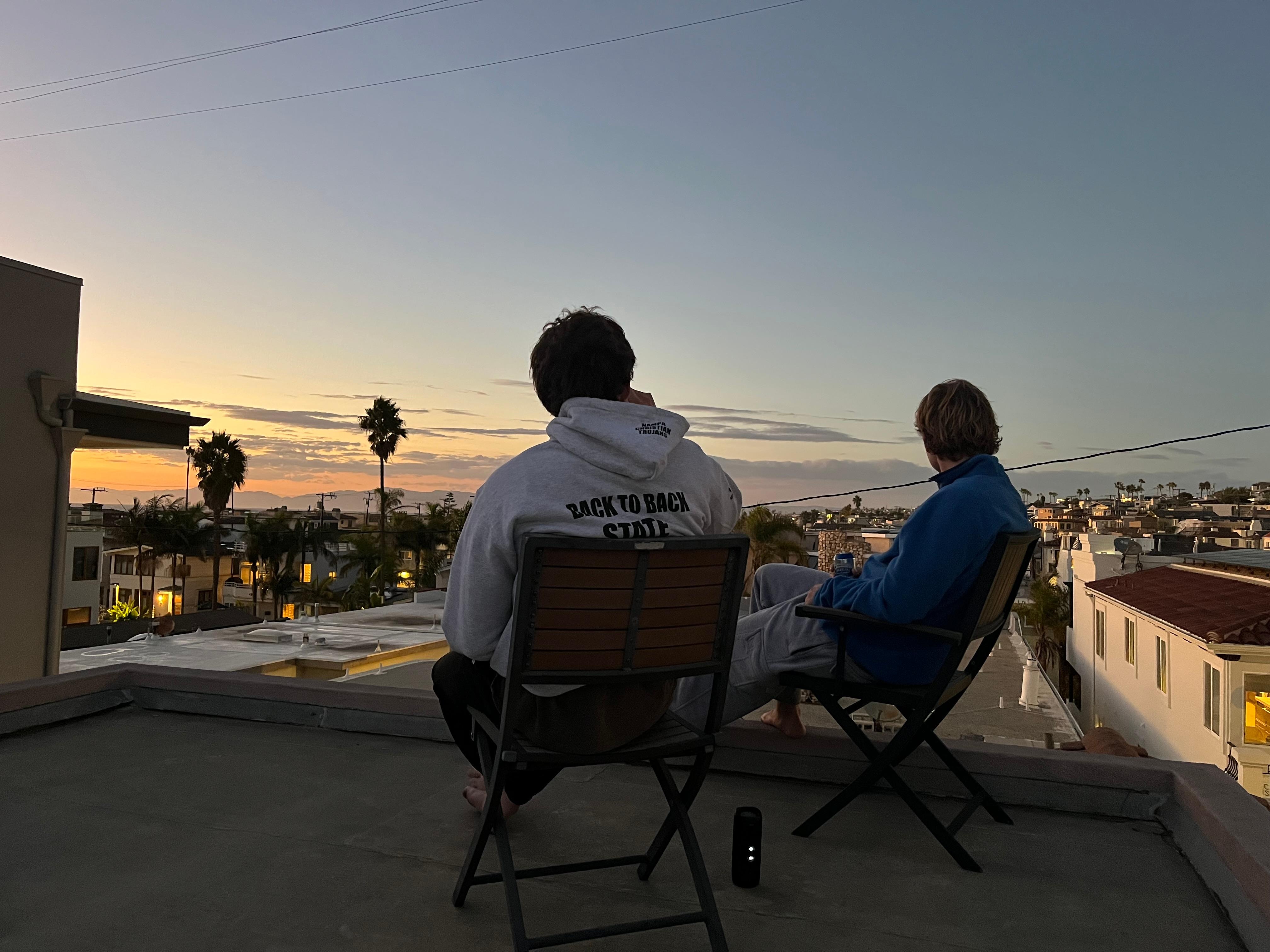 Roof top shared deck at sunset