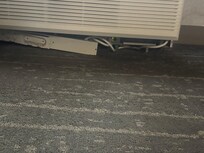 Exposed wires under the AC unit