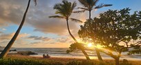 A neighbor hit this shot of us watching the sunrise. Beach chairs were provided in the outdoor closet off the lanai.