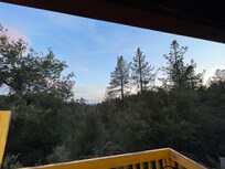 Can’t beat the sunsets and smell of pine on your balcony