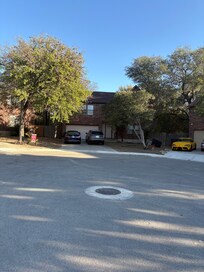 House at the end of dead end street in quiet neighborhood.