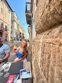 Little pizza spot right across the street a little way down with great food and Aperol Spritz!