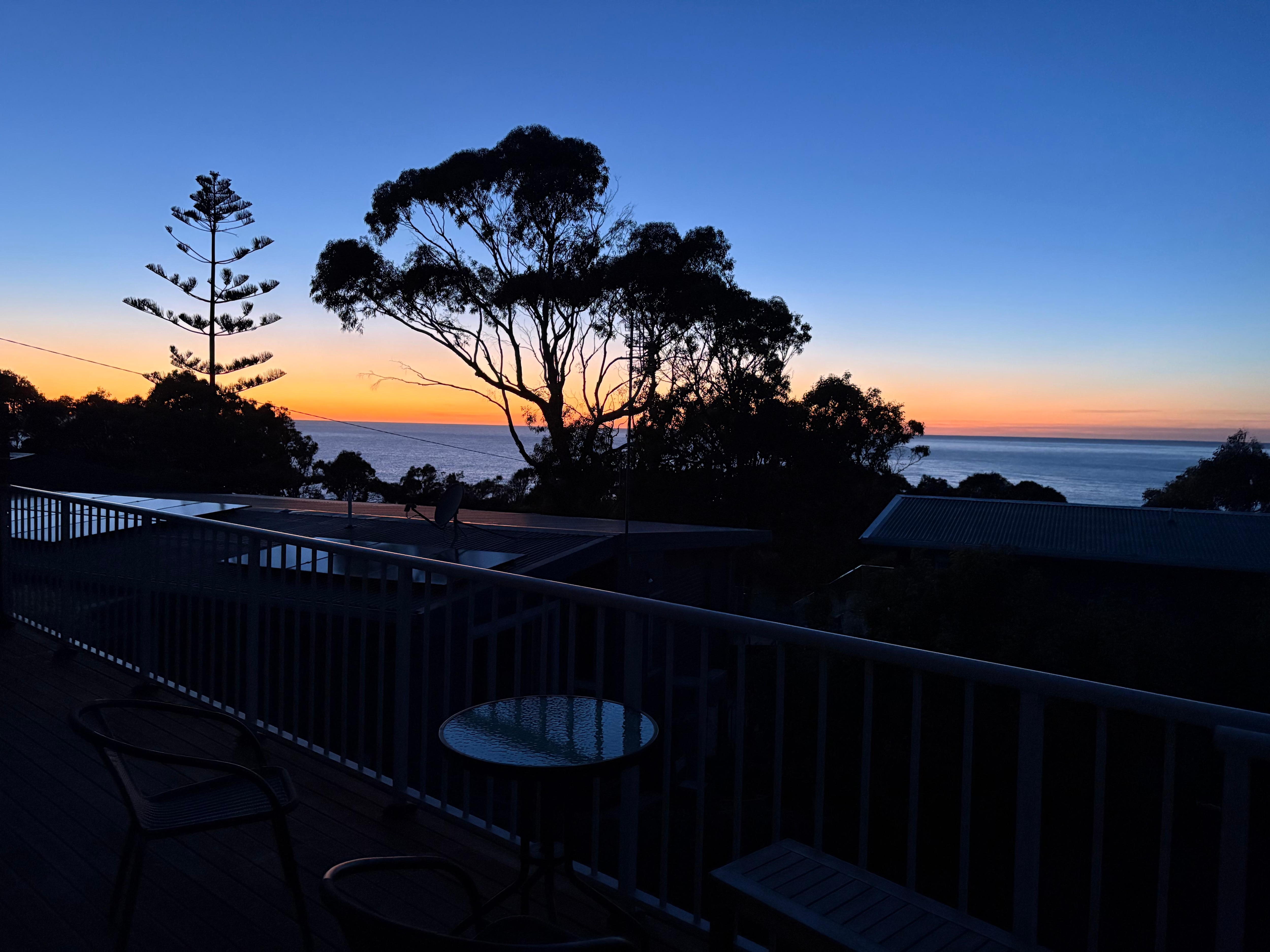 Sunrise over the water from our bedroom 