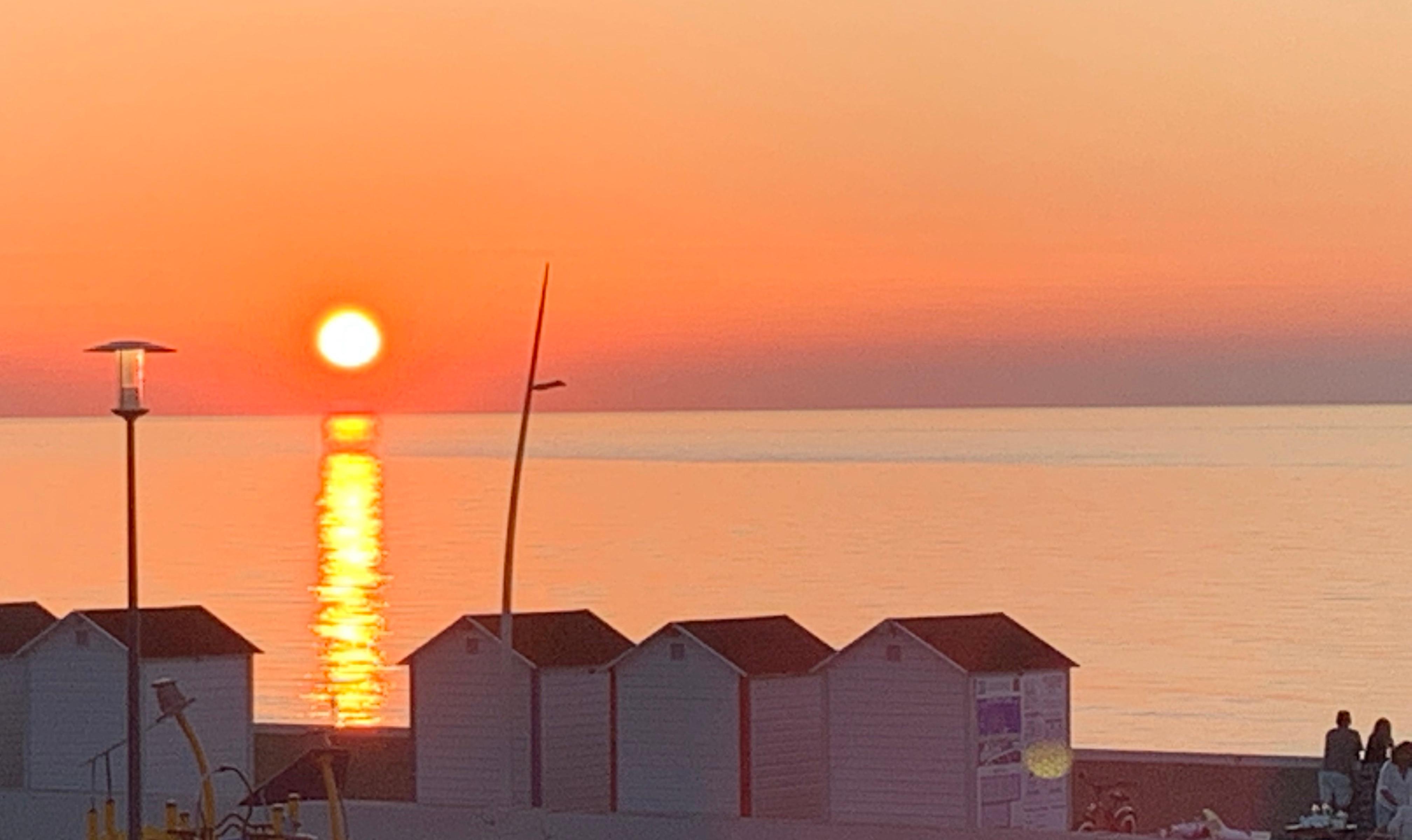 Zonsondergang vanaf balkon