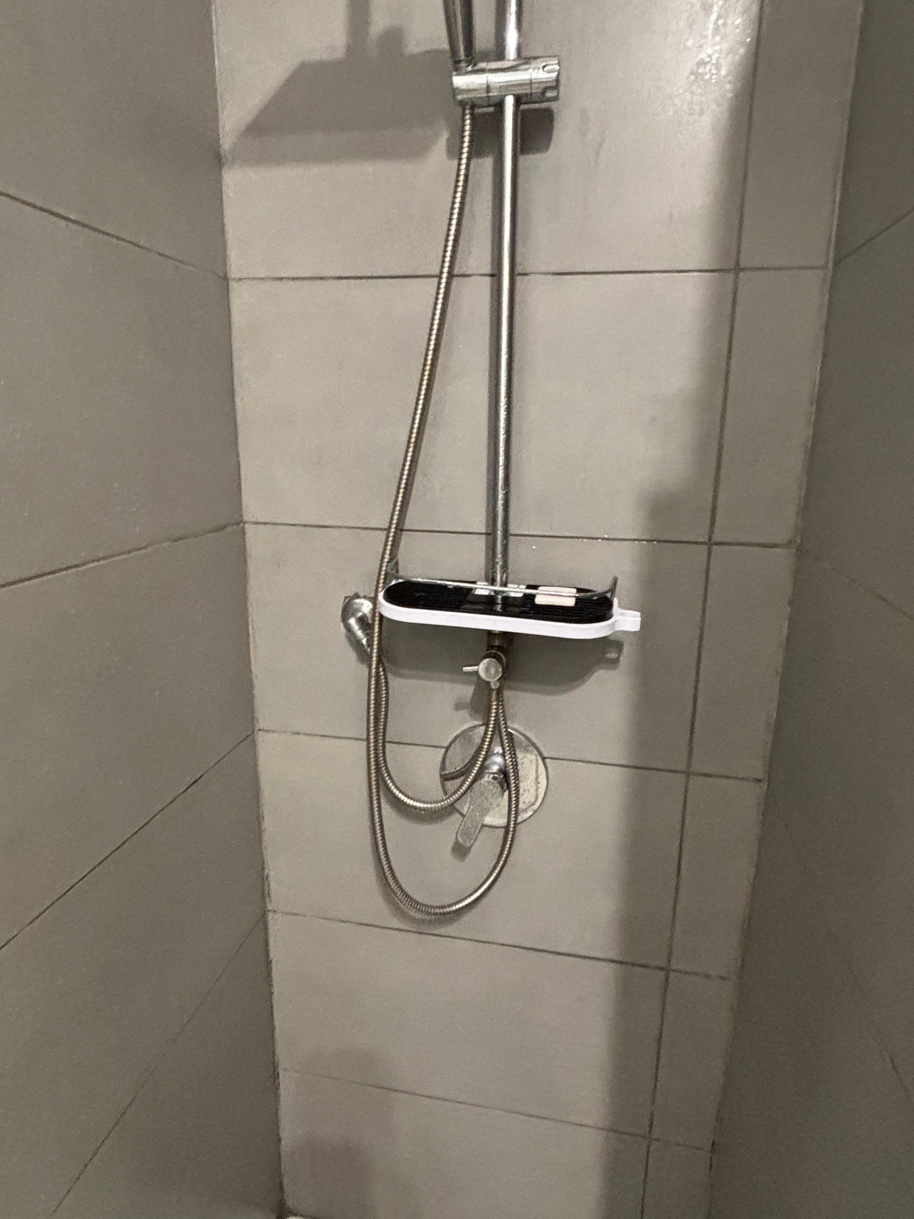 Mouldy shower, shower rack broken