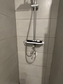 Mouldy shower, shower rack broken