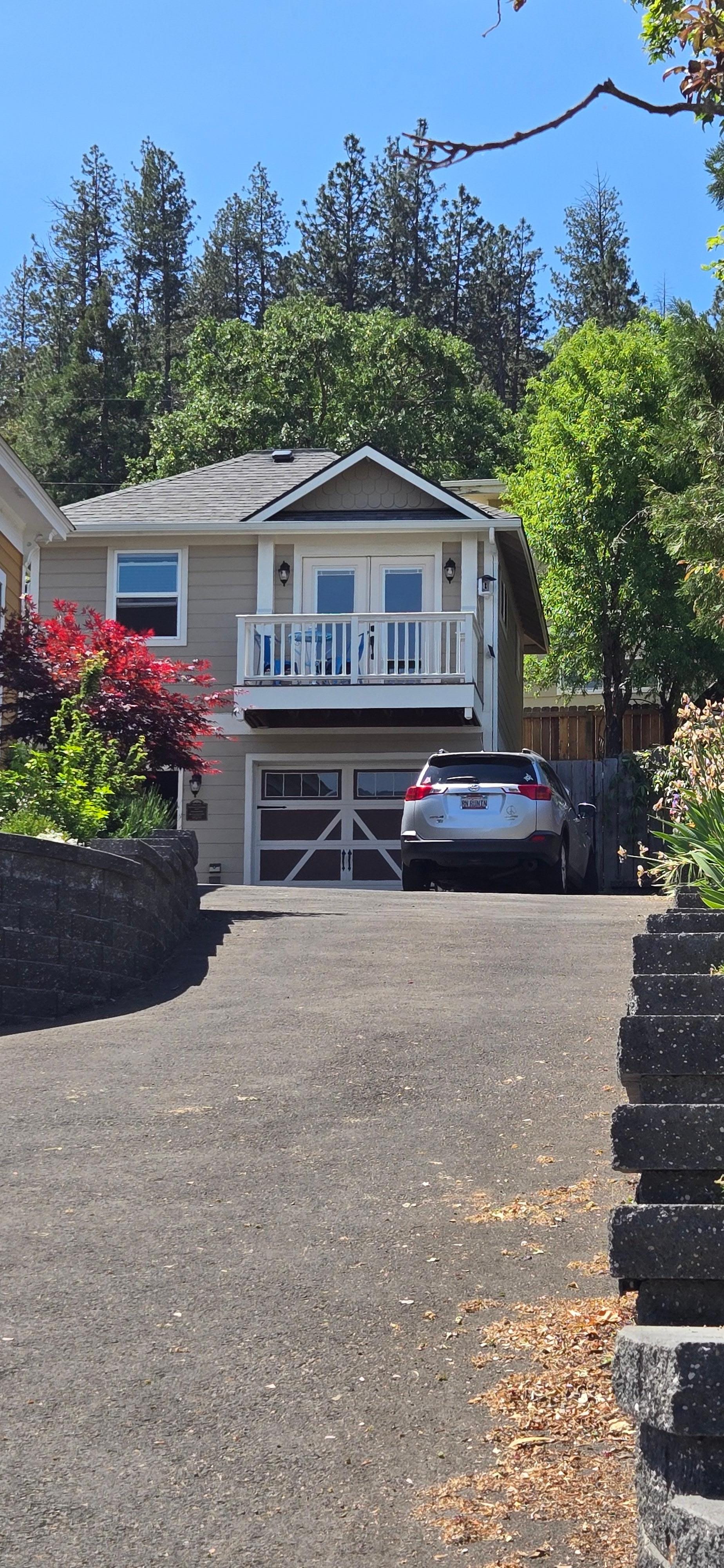 Carriage house at top of driveway