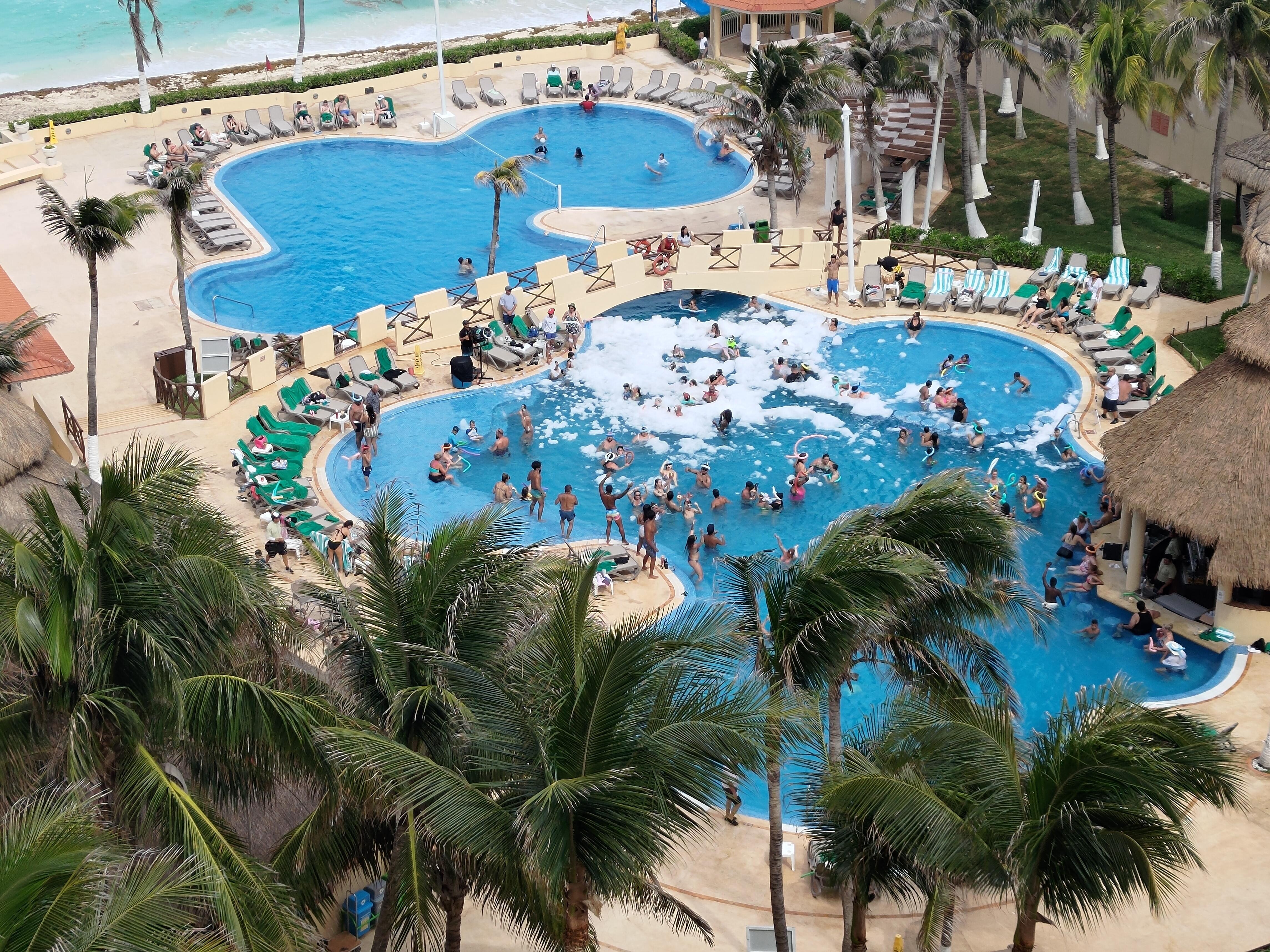 They are having some foam party in the pool