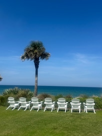 Chairs overlooking beach near adult pool.