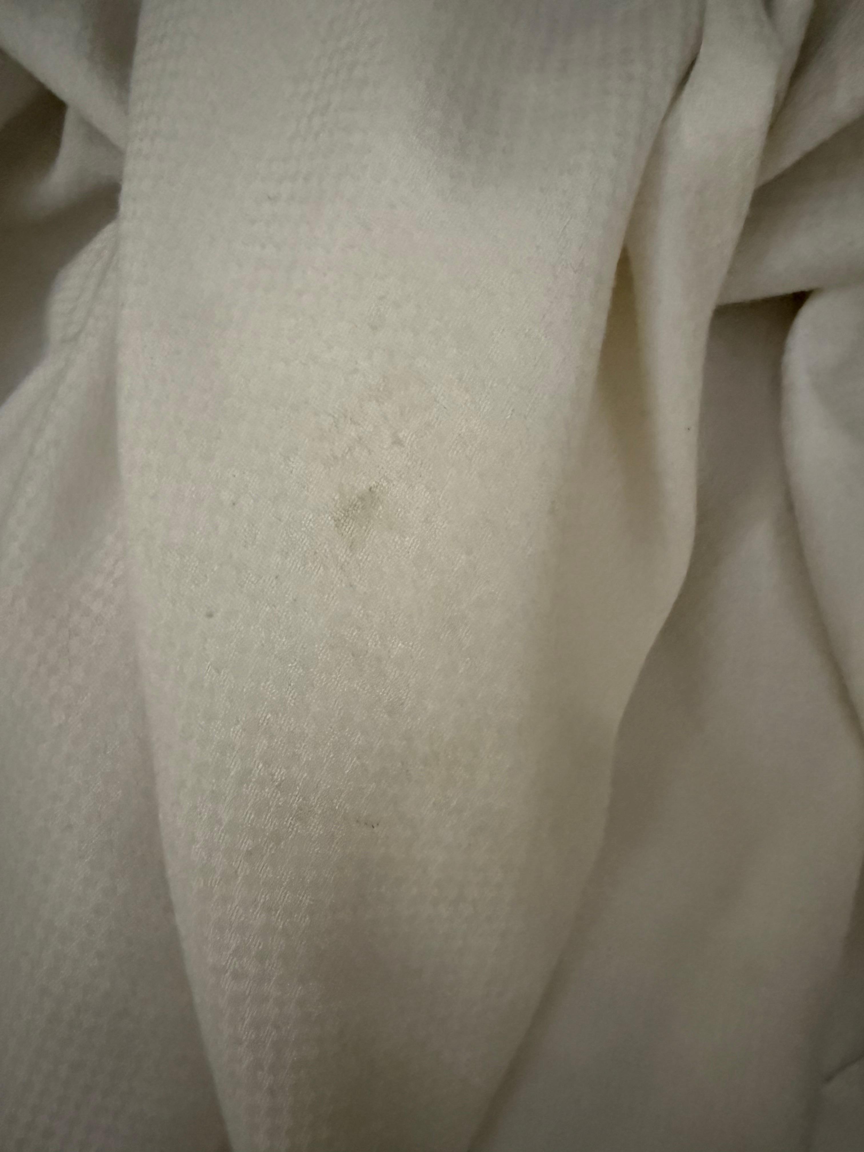 Dirty linen sheets and comforters 