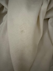 Dirty linen sheets and comforters