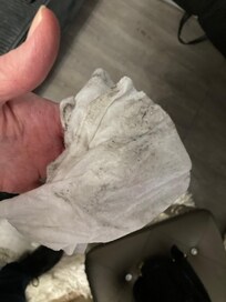 1st rag after wiping top surfaces of 3 dressers/ stands